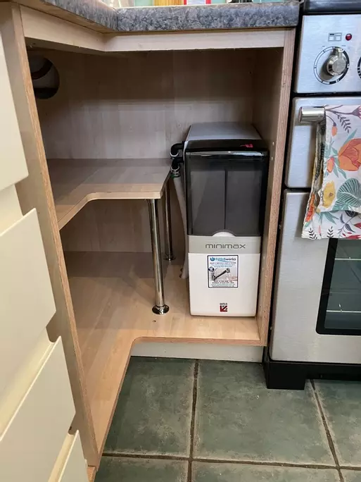 A corner cupboard installation